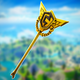 A golden axe with the Fortnite arena stretching out behind it.